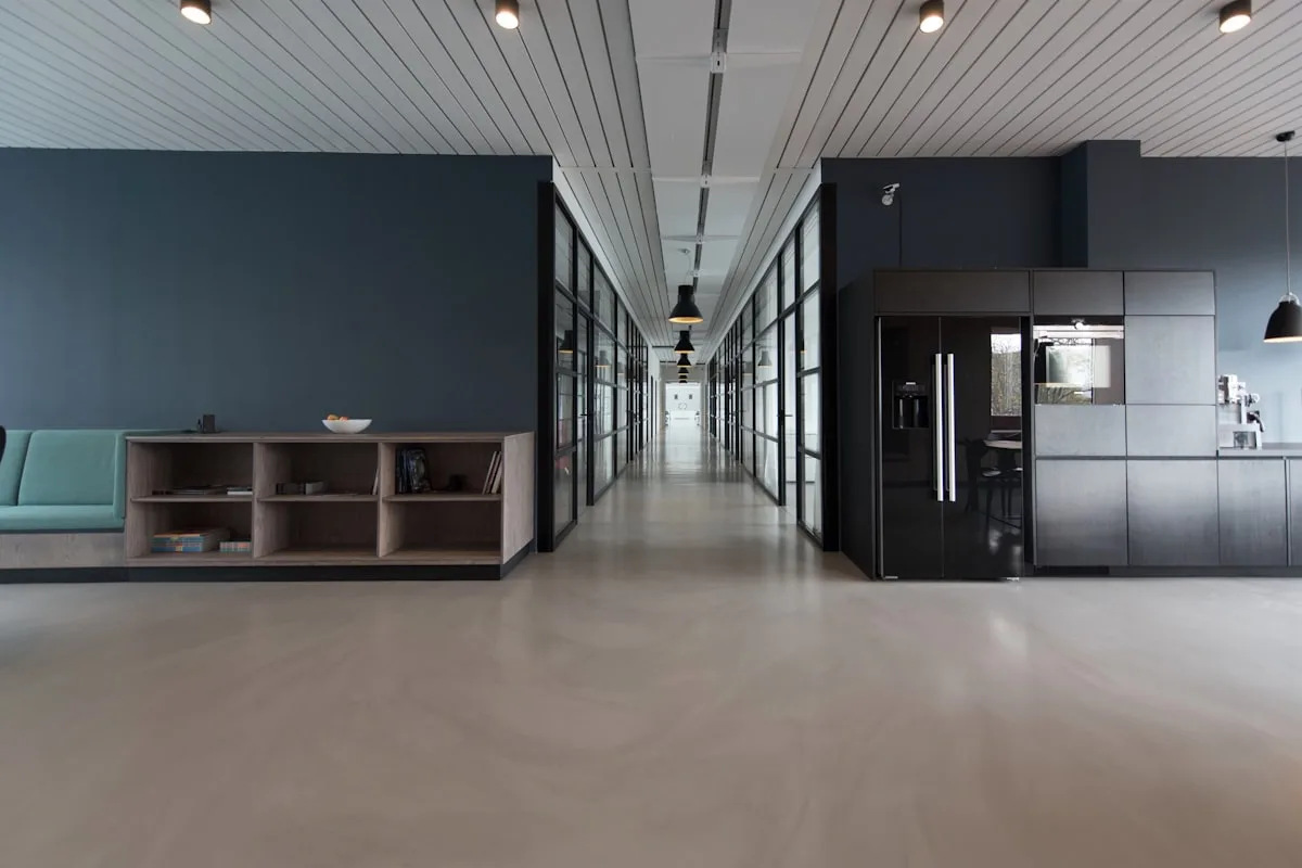 Private real estate consulting office with confidential documents and leather portfolio